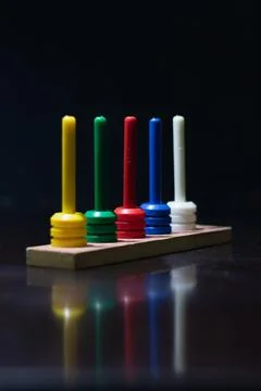 An abacus on a dark table Stock Photos