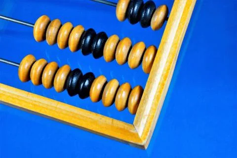 Abacus is a retro computing mechanical device. Stock Photos