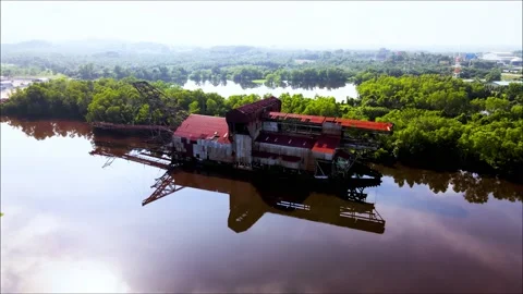 Abandon rustic old tin dredge mining ship Stock Footage 155794035