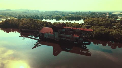 Abandon rustic old tin dredge mining ship Stock Footage 156693752