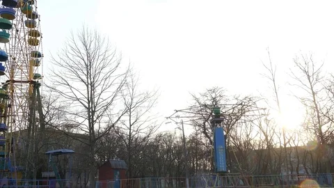 Abandoned amusement park at sunset Stock-Footage 83825532