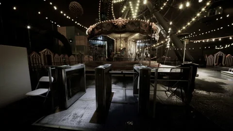 Abandoned amusement platform with harsh lighting and empty posts Stock Footage 340659773