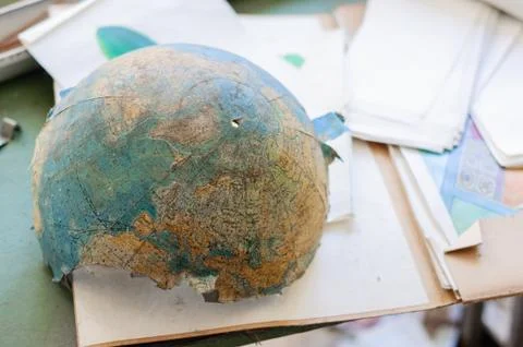 Abandoned and broken globe in a school Stock Photos