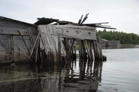 Abandoned and broken slip docs in a lake Stock Photos