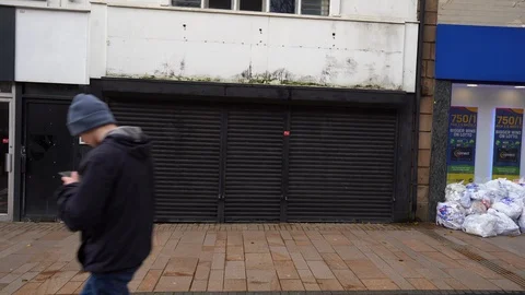 Abandoned and empty shops in the city centre due to high street decline Stock Footage 122589526