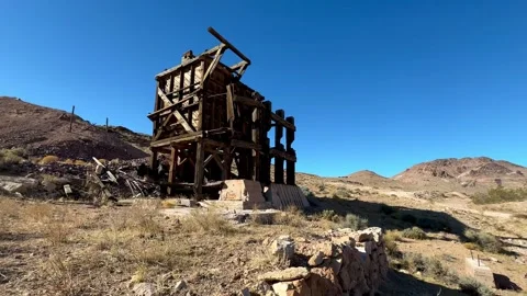 Abandoned and historic mining equipment in desert near Beatty, Nevada Stock Footage 299940730