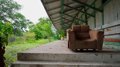 Abandoned Armchair at a Train Stop Stock Footage 293387157