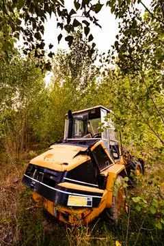 Abandoned backhoe in the forest in Ruidera. Stock Photos