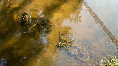 Abandoned Bicycles Underwater in River Video stock 320831759
