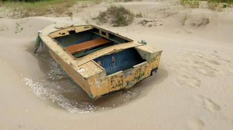 Abandoned boat on the beach Stock Footage 67238679