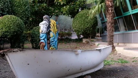 An abandoned boat in the park Stock Footage 83563359