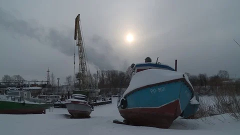 Abandoned boats on the pier in winter. Stock Footage 80742814