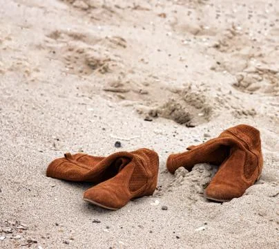 Abandoned boots Stock Photos