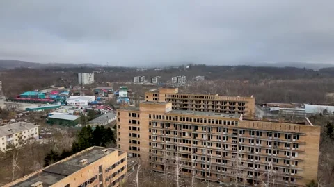 Abandoned Brick Buildings of Sadgorod Mud Treatment Clinic, Vladivostok, Russia Stock Footage 341426876