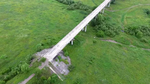 An abandoned bridge from the air Stock-Footage 67876810
