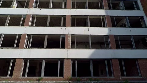 Abandoned building with broken windows Stock Footage 130208927