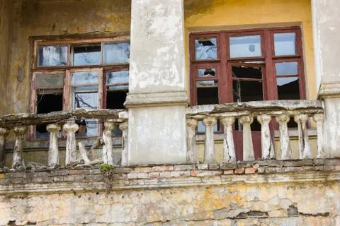 Abandoned building with broken windows Stock Photos