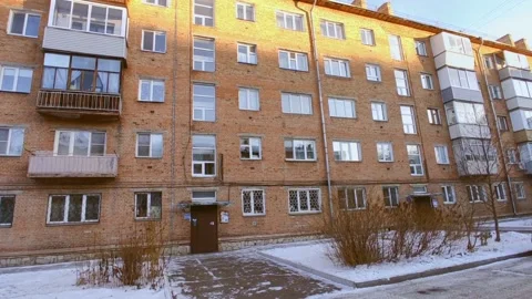Abandoned building with broken windows in winter Stock Footage 226749430