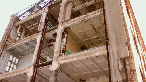 Abandoned building with broken windows in winter Stock Footage 226749497