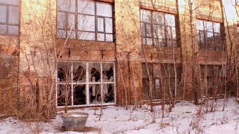 Abandoned building with broken windows in winter Stock Footage 226749564