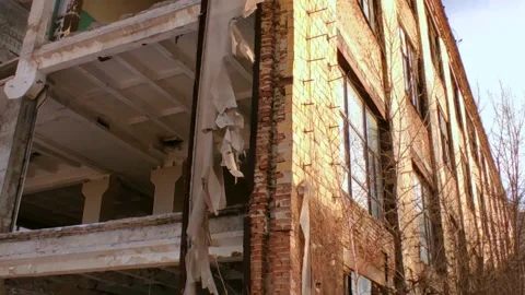 Abandoned building with broken windows in winter Stock Footage 226749598
