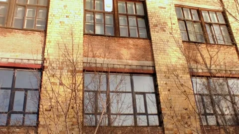 Abandoned building with broken windows in winter Stock Footage 226749631