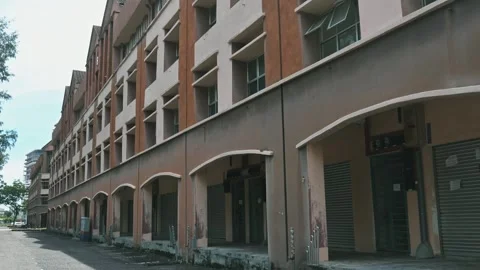 Abandoned building facade standing empty, urban decay environment Video stock 335185410