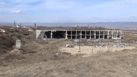 Abandoned building of the former factory Stock Footage 75562895