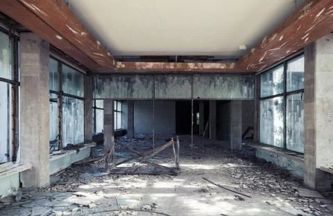 Abandoned building interior. Corridor perspective Stock Photos
