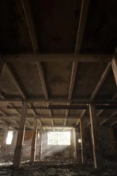 Abandoned building with light coming by the window Stock Photos