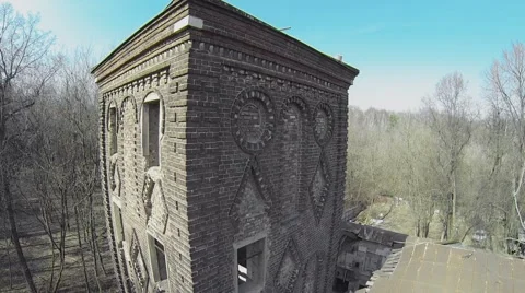 Abandoned building with tower at spring sunny day. Aerial view Stock Footage 41763421