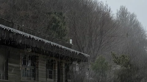 Abandoned Building Under Falling Snow in Winter Stock Footage 331666968