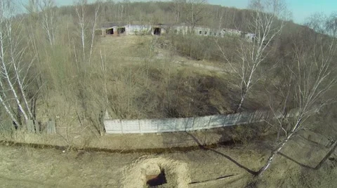 Abandoned building of workshop among plants. Aerial view Stock Footage 41763202