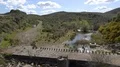 Abandoned buildings with river, rocks and dry hills landscape at Mértola Prt 4k or 4k+ Resolution