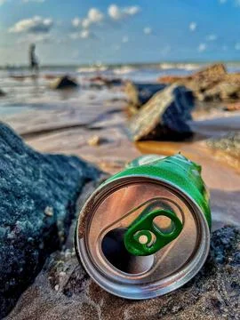 Abandoned can on the beach Stock Photos