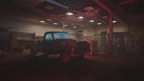 Abandoned car garage full of broken down vehicles and forgotten tools Stock Footage 320046652