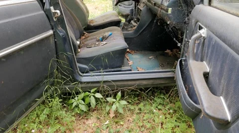 Abandoned car in nature Stock Footage 63303251