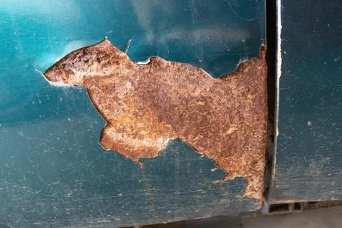 Abandoned car rusty close-up. Stock Photos