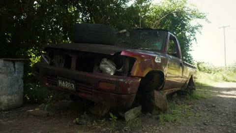 Abandoned car on the side of the road Stock Footage 146665907