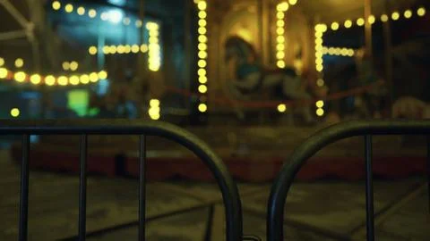 Abandoned carousel at night with warm lights and festive atmosphere Stock Illustration