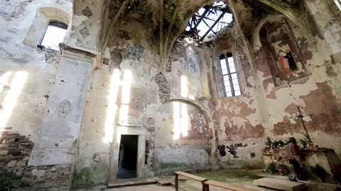 Abandoned church with sun rays and grey stone Stock Footage 70115969