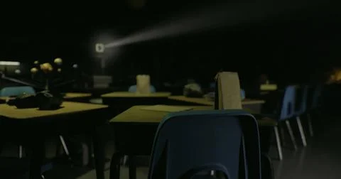 Abandoned classroom setting with projection light in dim atmosphere 库存插图