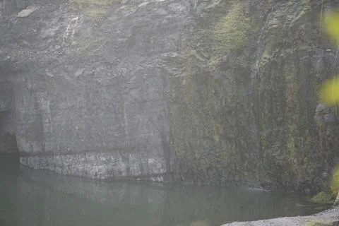 Abandoned coal mining quarry filled with rainwater, Stock Photos