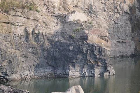 Abandoned coal mining quarry filled with rainwater, Stock Photos