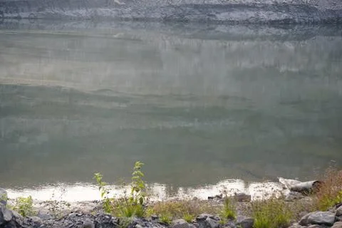 Abandoned coal mining quarry filled with rainwater, Stock Photos