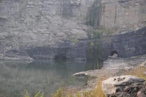 Abandoned coal mining quarry filled with rainwater, Stock Photos