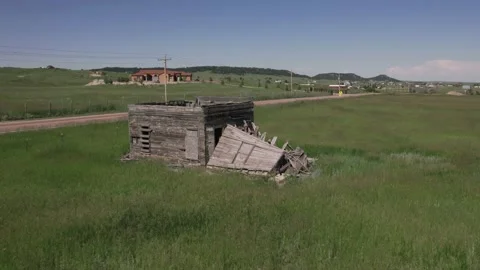 Abandoned Collapsed House in a Field Pan Around 4K Stock Footage 246007220