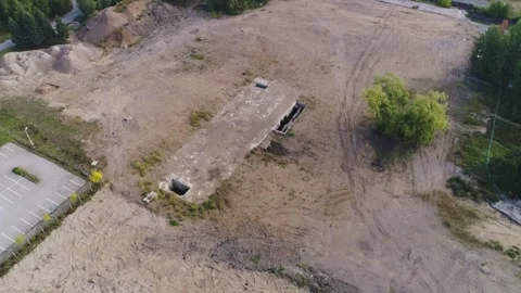 Abandoned Concrete Bunker - Top Down Drone View Over Empty Development Site Stock Footage 344078278