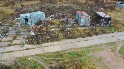 Abandoned construction site and garbage dump Stock Footage 142588934