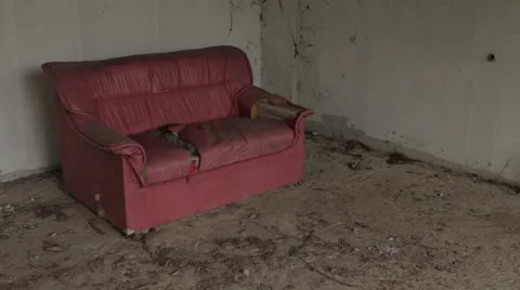 Abandoned Damaged Sofa Couch Chair Left In Derelict Building Hand Held Vídeos de archivo 54661373